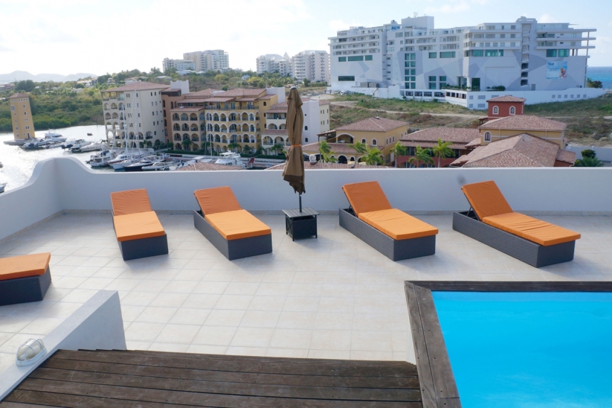 Condo Syriana  | Ocean View - Located in  Tropical Porto Cupecoy with Private Pool